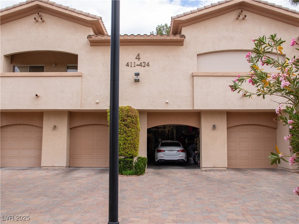 2050 West Warm Springs Road, Unit 411 Henderson, NV 89014 - Photo 19 of 30 an attached garage