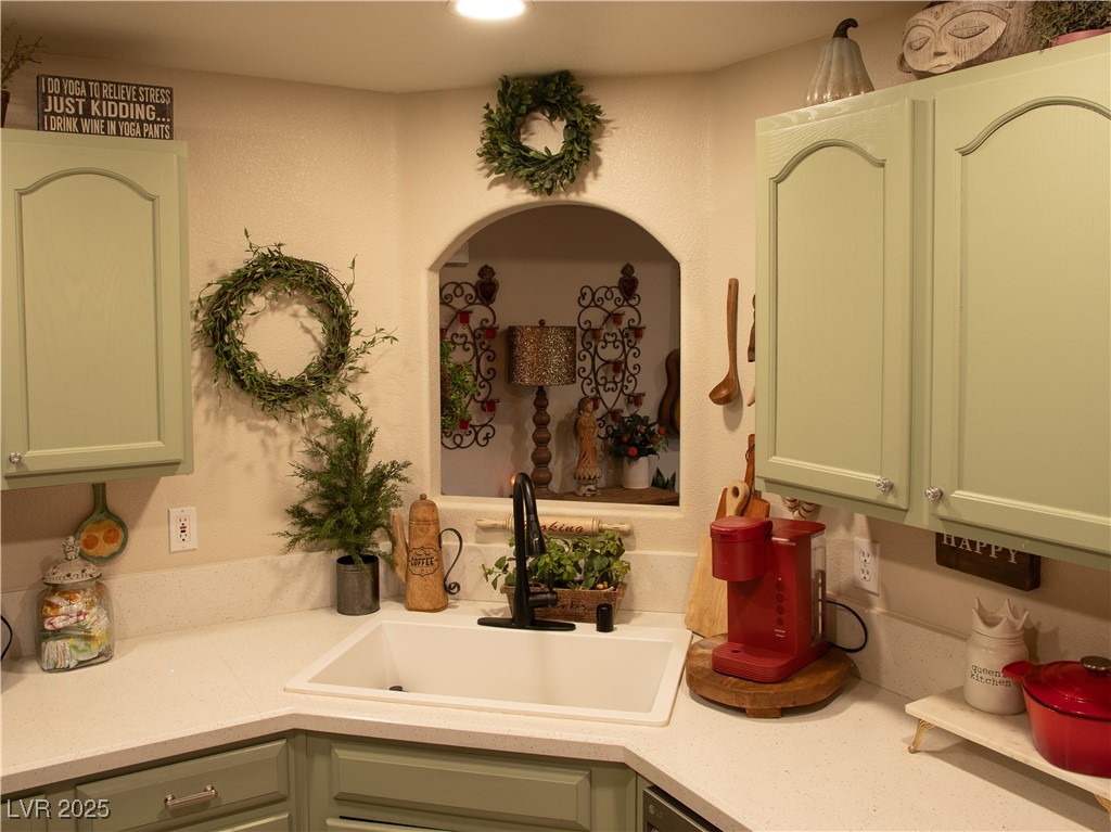 2050 West Warm Springs Road, Unit 411 Henderson, NV 89014 - Photo 4 of 30 Kitchen with light countertops and a sink