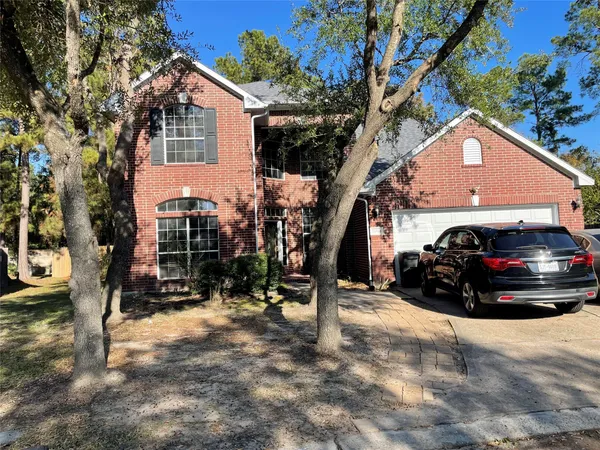 a view of car parked in front of house