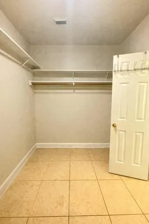 a view of a room with an empty space