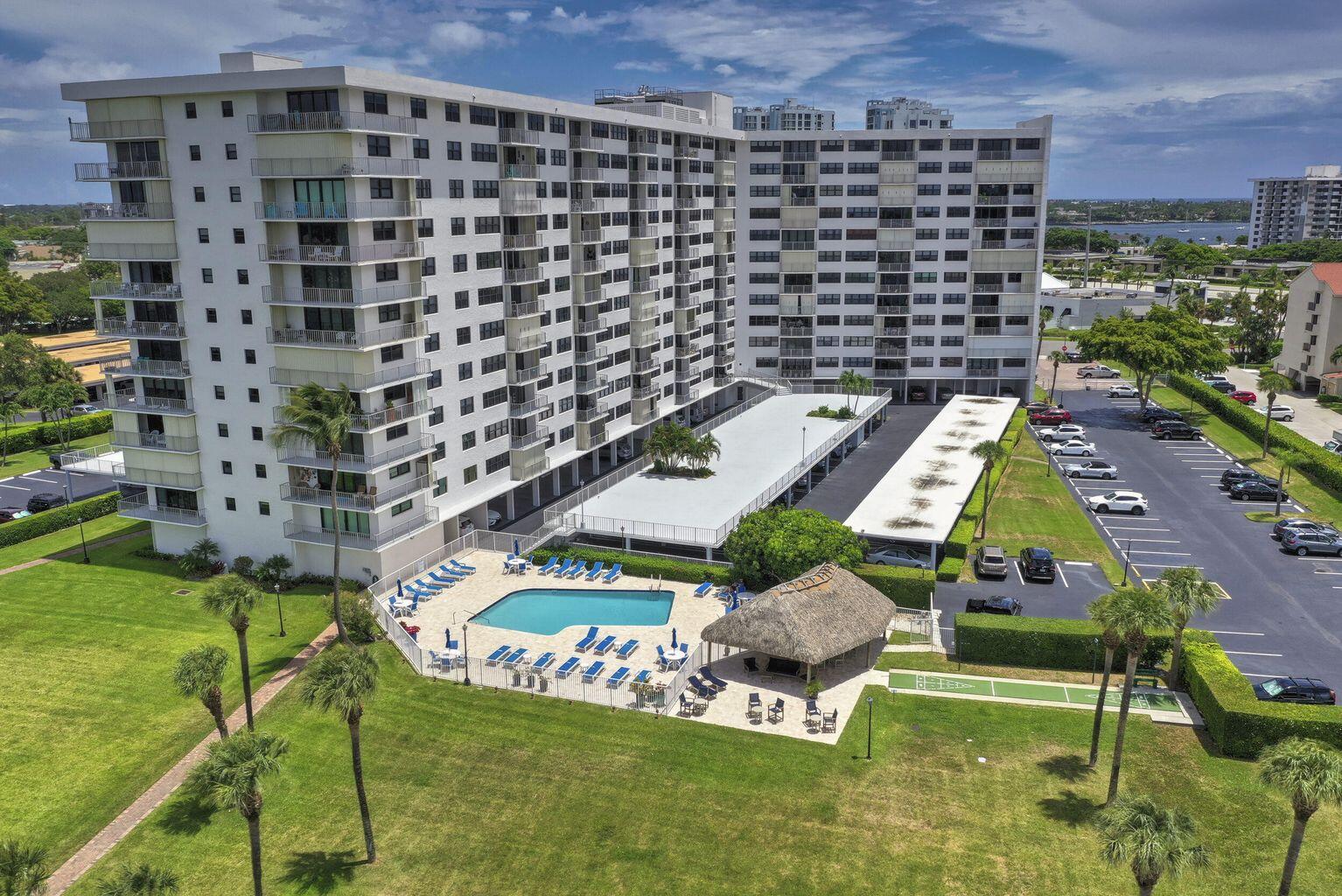 336 Golfview Road, Unit 203 North Palm Beach, FL 33408 - Photo 16 of 43 a picture of city view with tall buildings