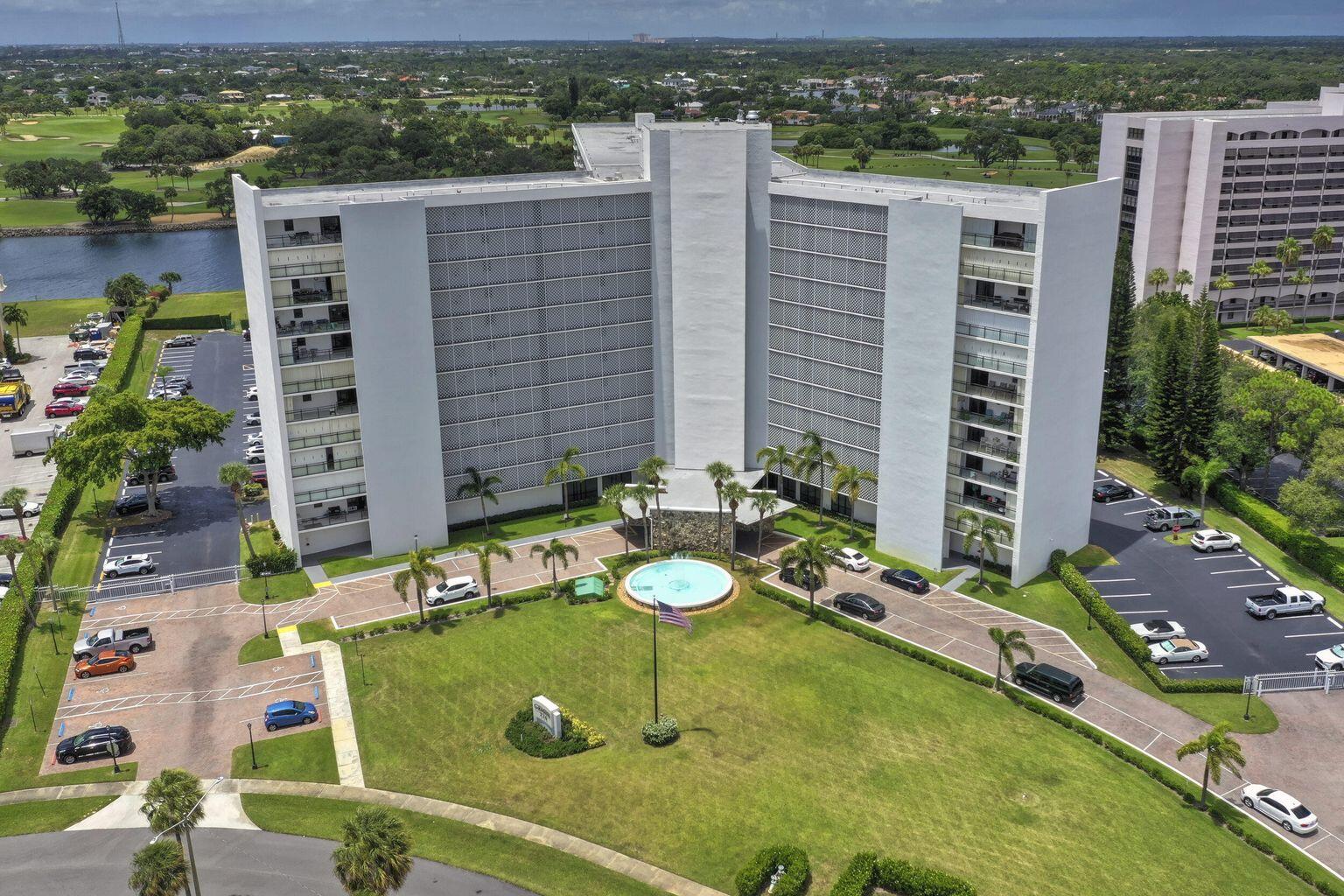 336 Golfview Road, Unit 203 North Palm Beach, FL 33408 - Photo 37 of 43 a view of a chairs and table in patio