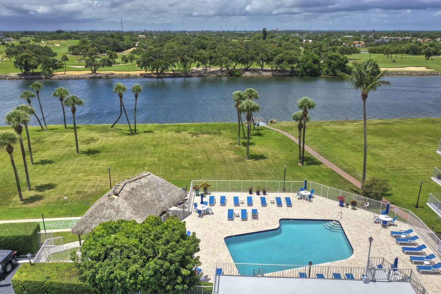 336 Golfview Road, Unit 203 North Palm Beach, FL 33408 - Photo 42 of 43 a view of a lake from a balcony