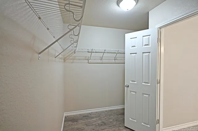 a view of small space with racks on the wall