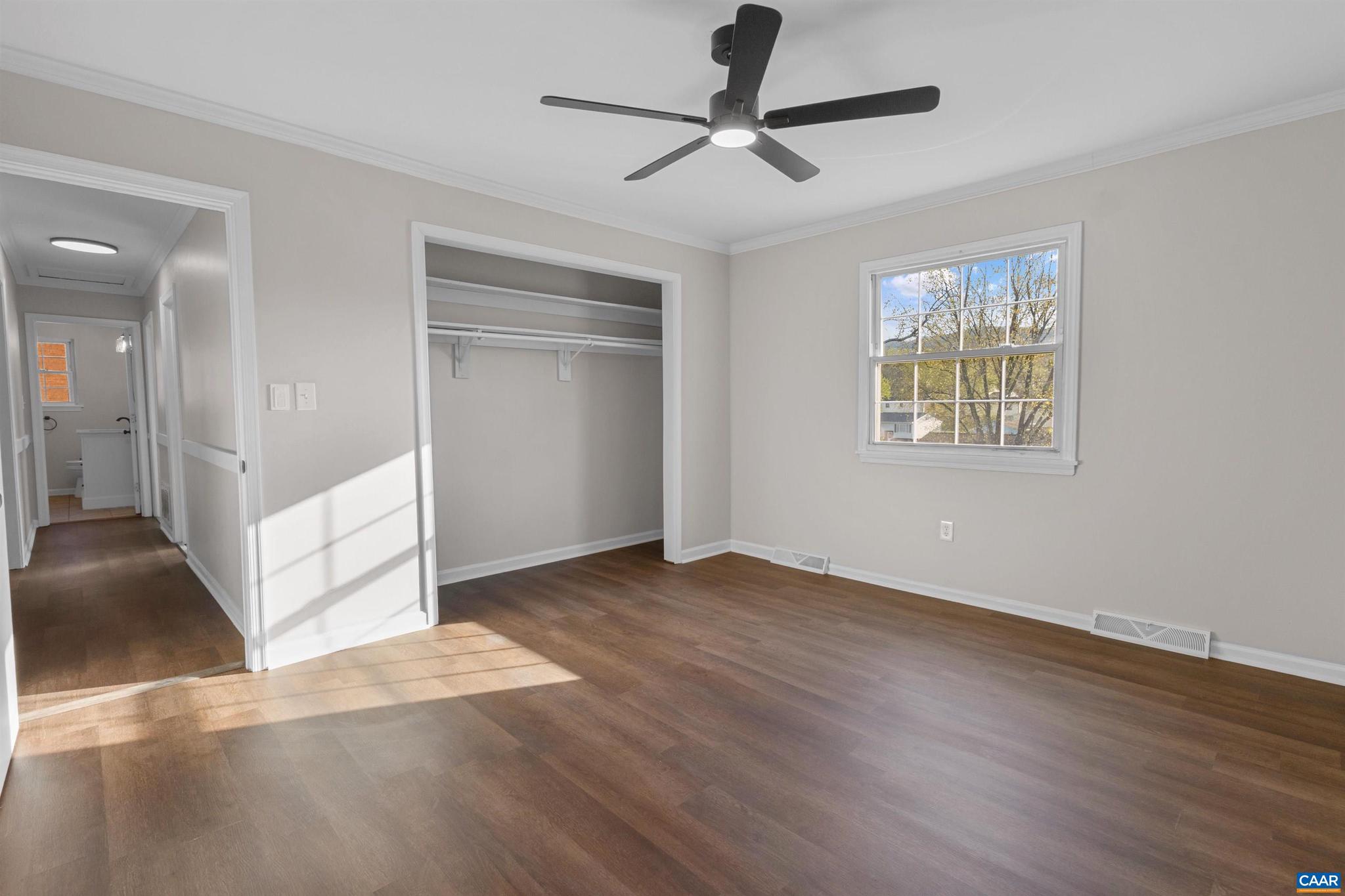 3053 Woodway Road Roanoke, VA 24014 - Photo 14 of 33 a view of an empty room with wooden floor and a window