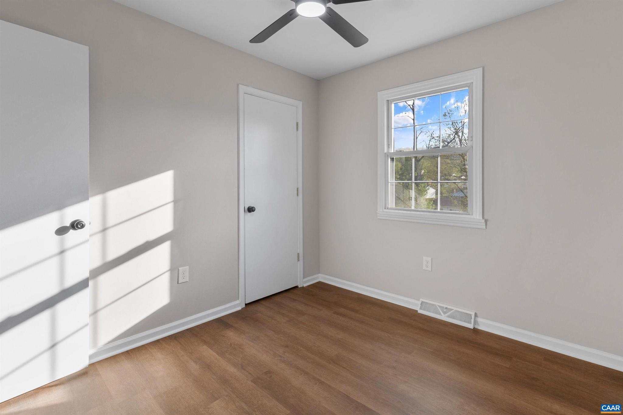 3053 Woodway Road Roanoke, VA 24014 - Photo 20 of 33 an empty room with a empty space and windows