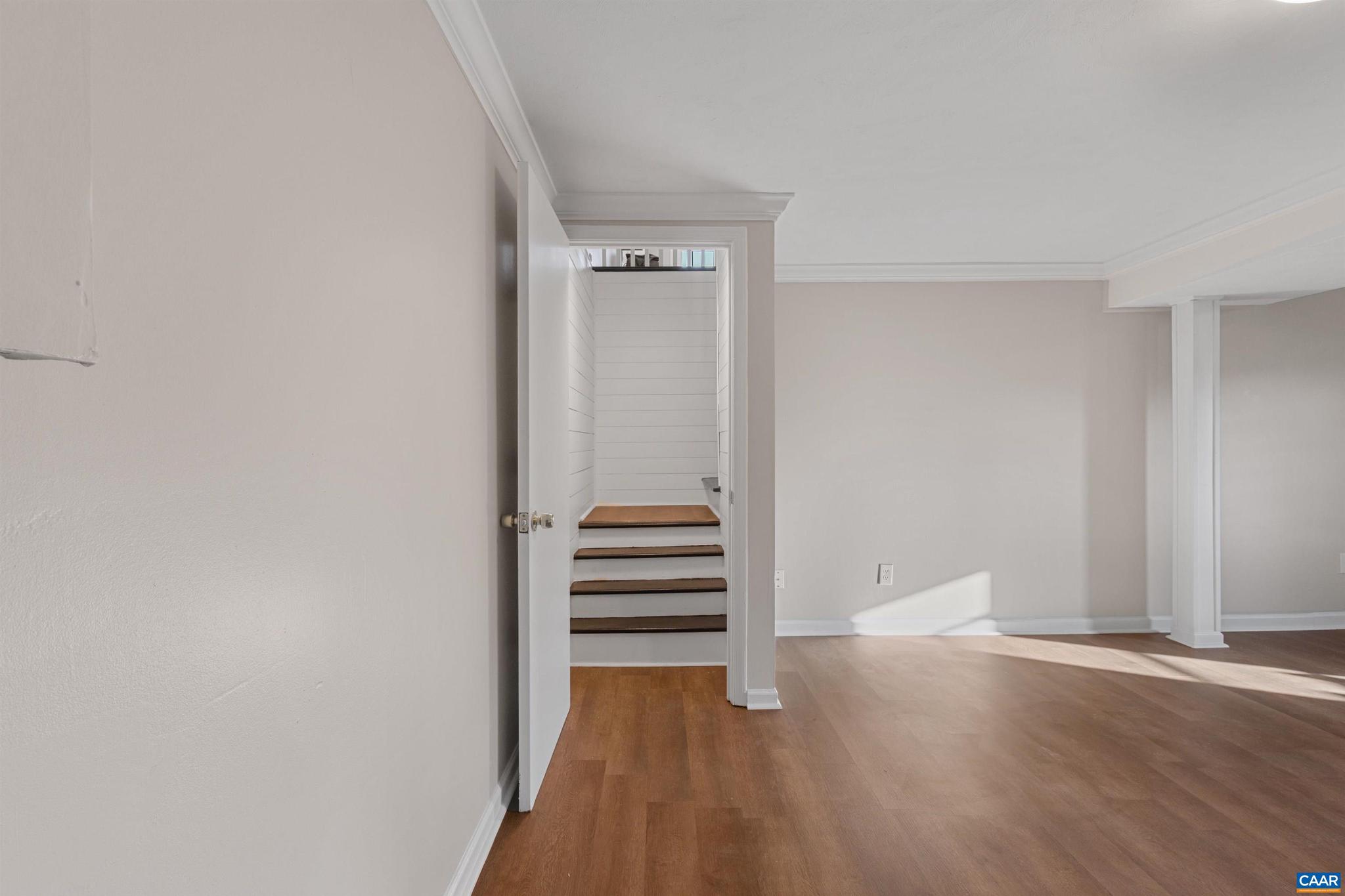 3053 Woodway Road Roanoke, VA 24014 - Photo 24 of 33 a view of a room with wooden floor and white walls