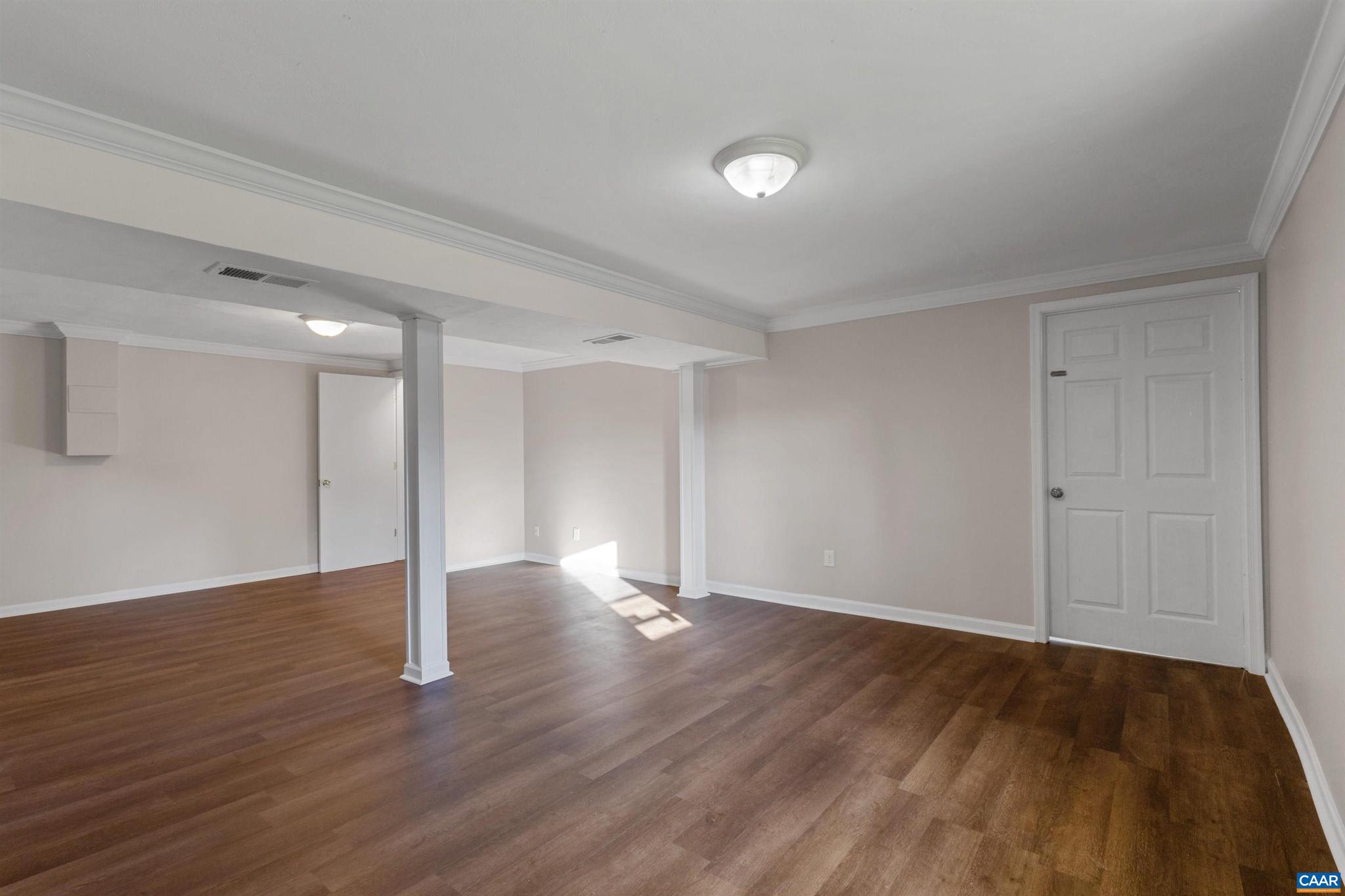 3053 Woodway Road Roanoke, VA 24014 - Photo 27 of 33 a view of an empty room with wooden floor