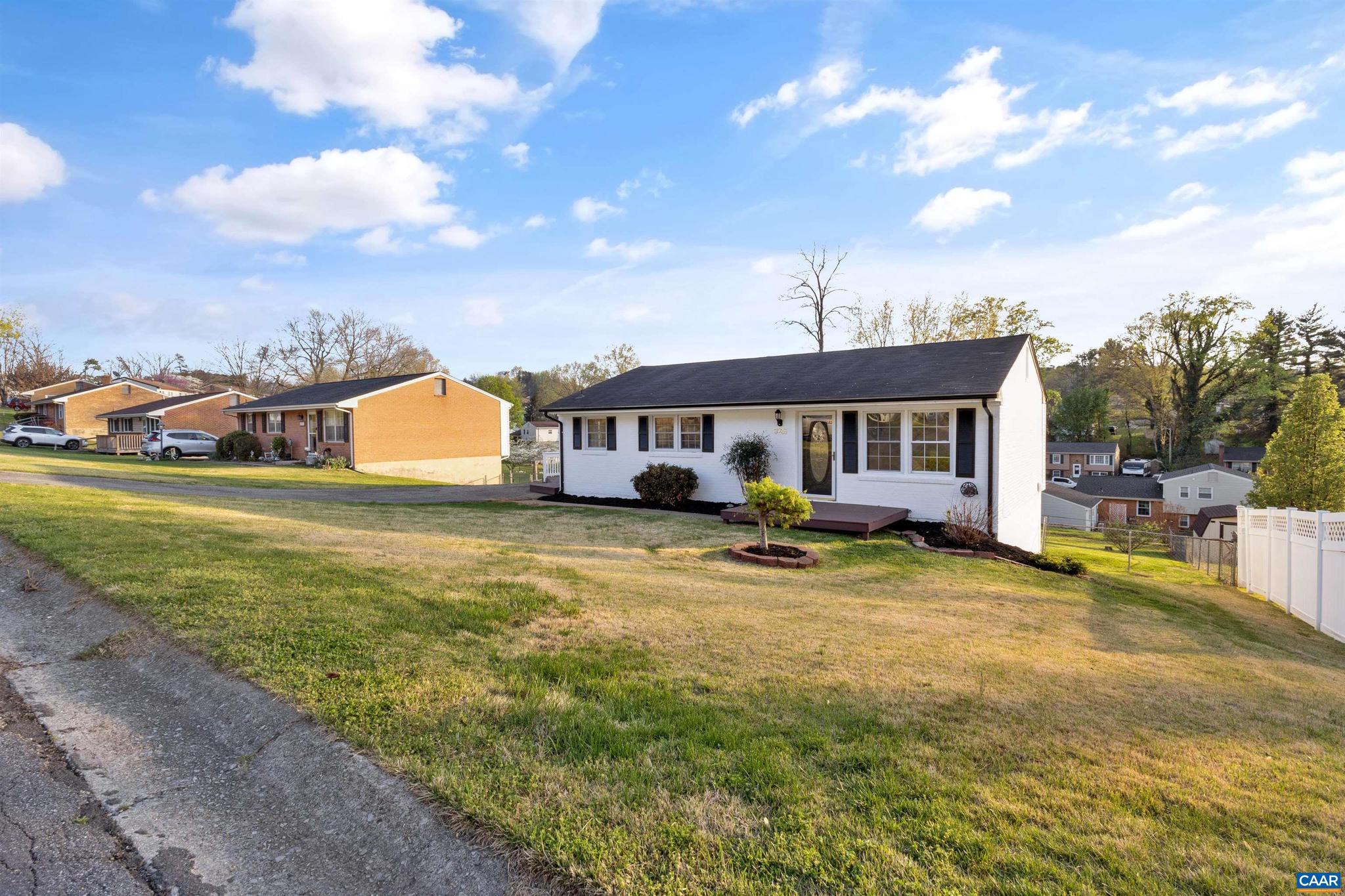 3053 Woodway Road Roanoke, VA 24014 - Photo 4 of 33 a front view of a house with swimming pool having outdoor seating