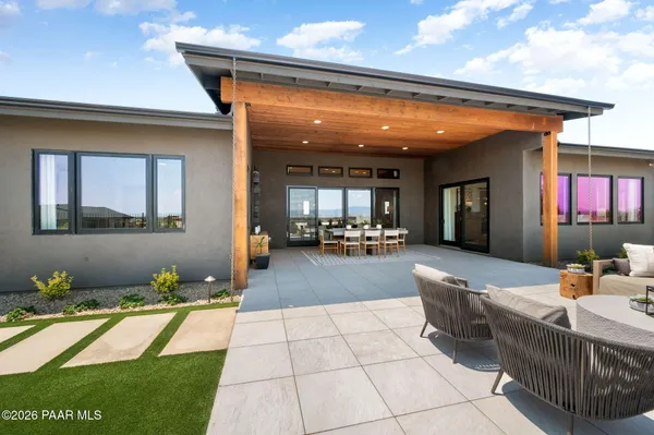 a lobby with furniture and rug