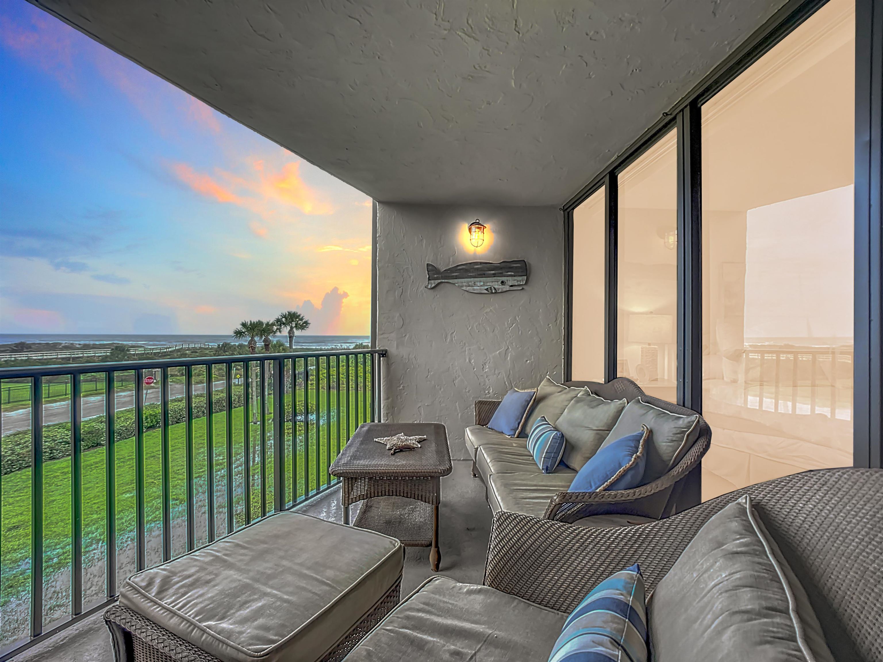 1 Dondanville Road, Unit 216C St. Augustine, FL 32080 - Photo 1 of 58 a living room with furniture and a floor to ceiling window