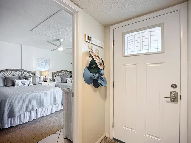 a bedroom with a bed and a walk in closet