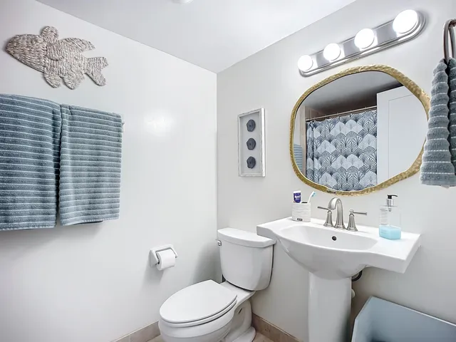 a view of a city with an ocean view