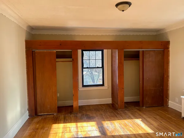 an empty room with window