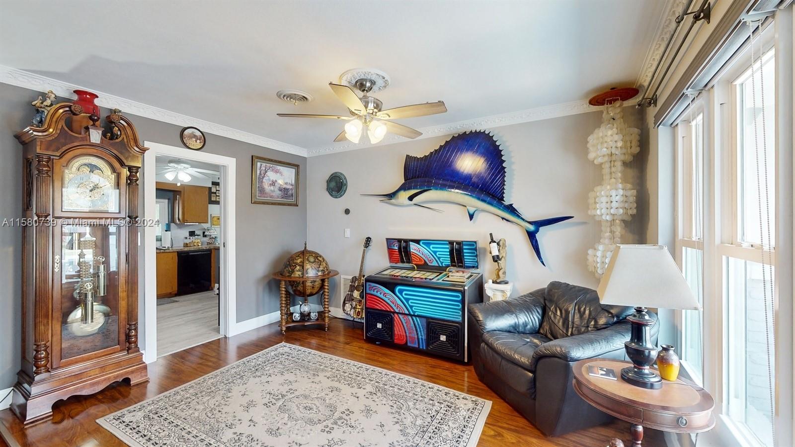5424 Harrison Street Hollywood, FL 33021 - Photo 12 of 27 a living room with furniture and a window