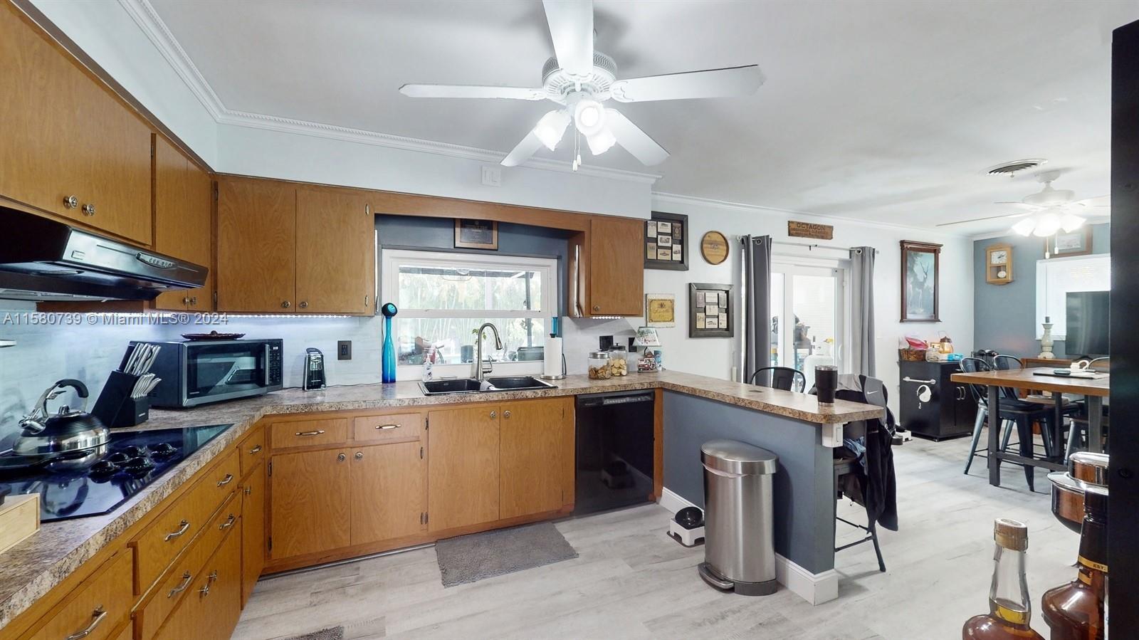 5424 Harrison Street Hollywood, FL 33021 - Photo 13 of 27 a kitchen with lots of counter top space