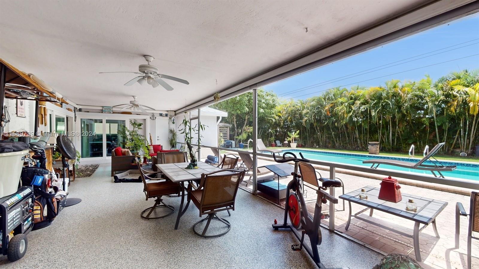 5424 Harrison Street Hollywood, FL 33021 - Photo 26 of 27 a view of a chairs and tables in patio