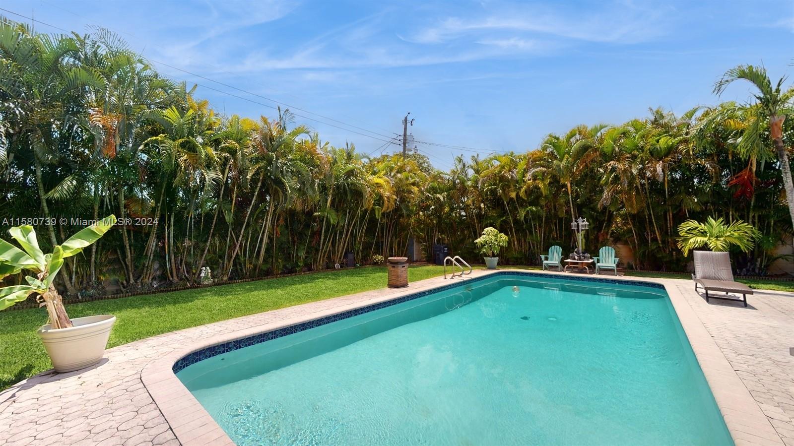 5424 Harrison Street Hollywood, FL 33021 - Photo 27 of 27 a view of a backyard with swimming pool