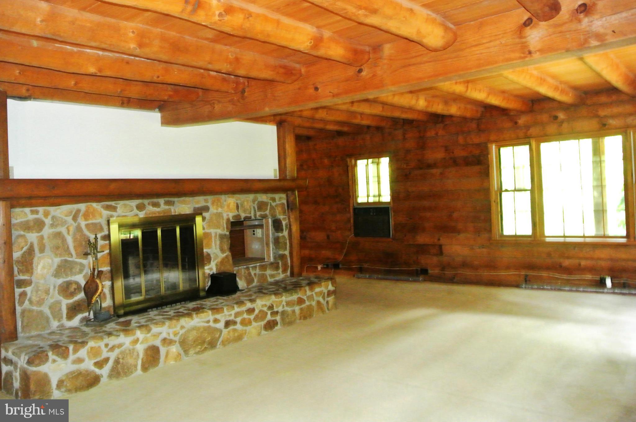 12408 Clark Road Worton, MD 21678 - Photo 8 of 21 Living Room w. field stone fireplace