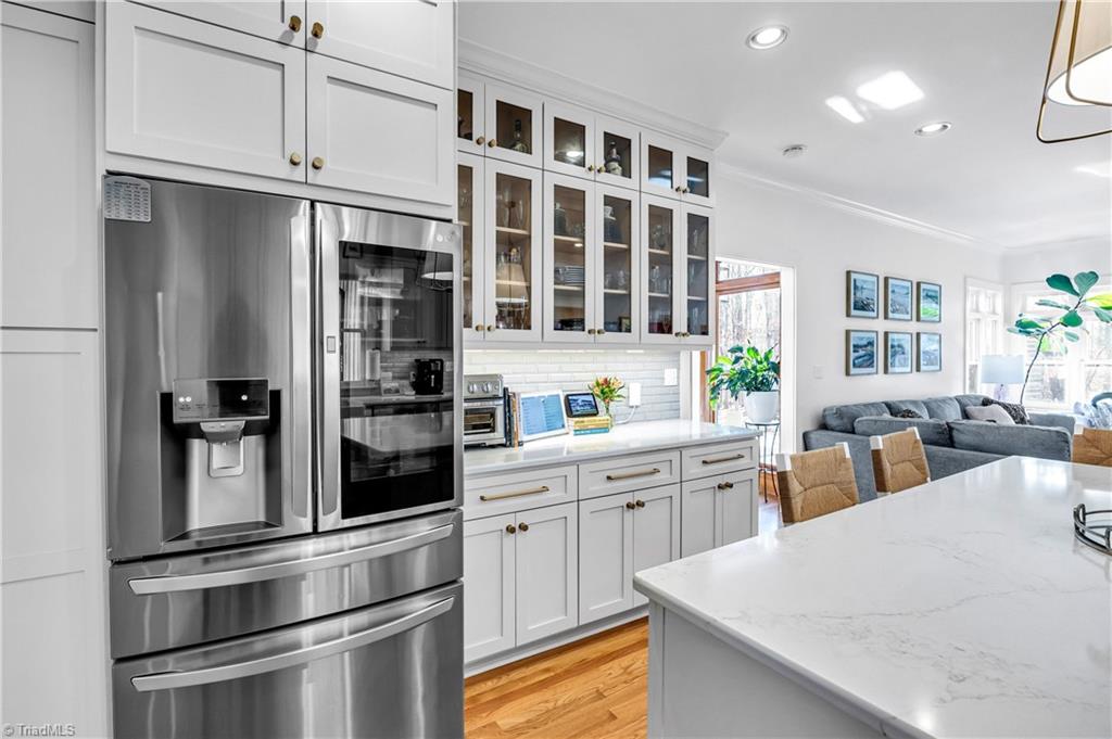 7042 Brookbank Road Summerfield, NC 27358 - Photo 11 of 50 Quartz countertops & custom cabinetry