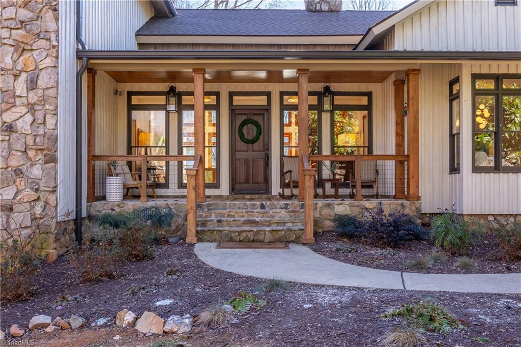 7042 Brookbank Road Summerfield, NC 27358 - Photo 2 of 50 Covered front porch