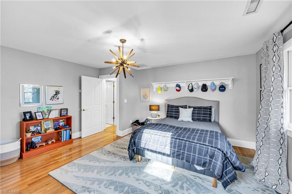 7042 Brookbank Road Summerfield, NC 27358 - Photo 32 of 50 3rd bedroom with hardwoods