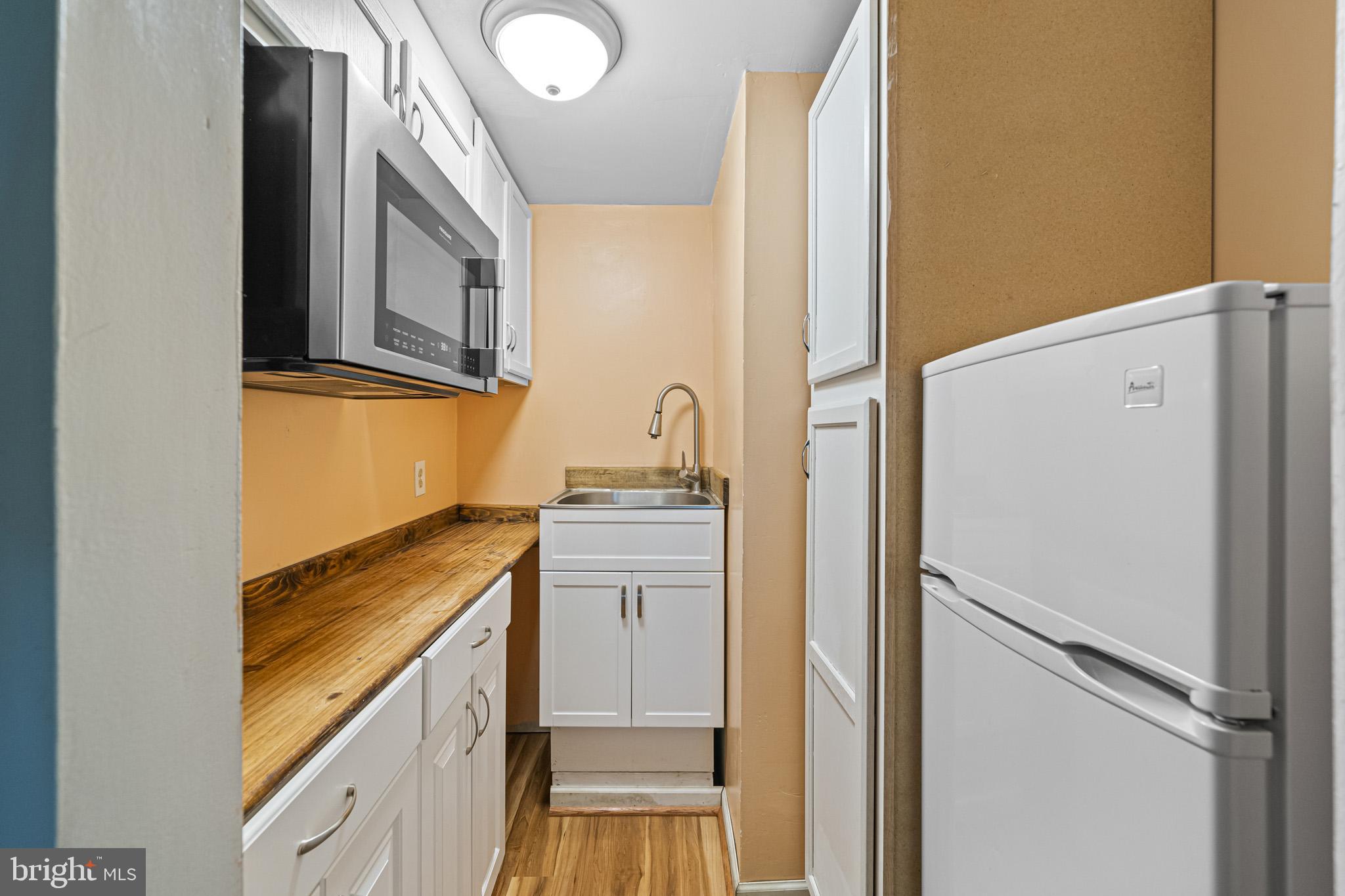 370 Red Cloud Road Lusby, MD 20657 - Photo 14 of 40 Basement kitchenette