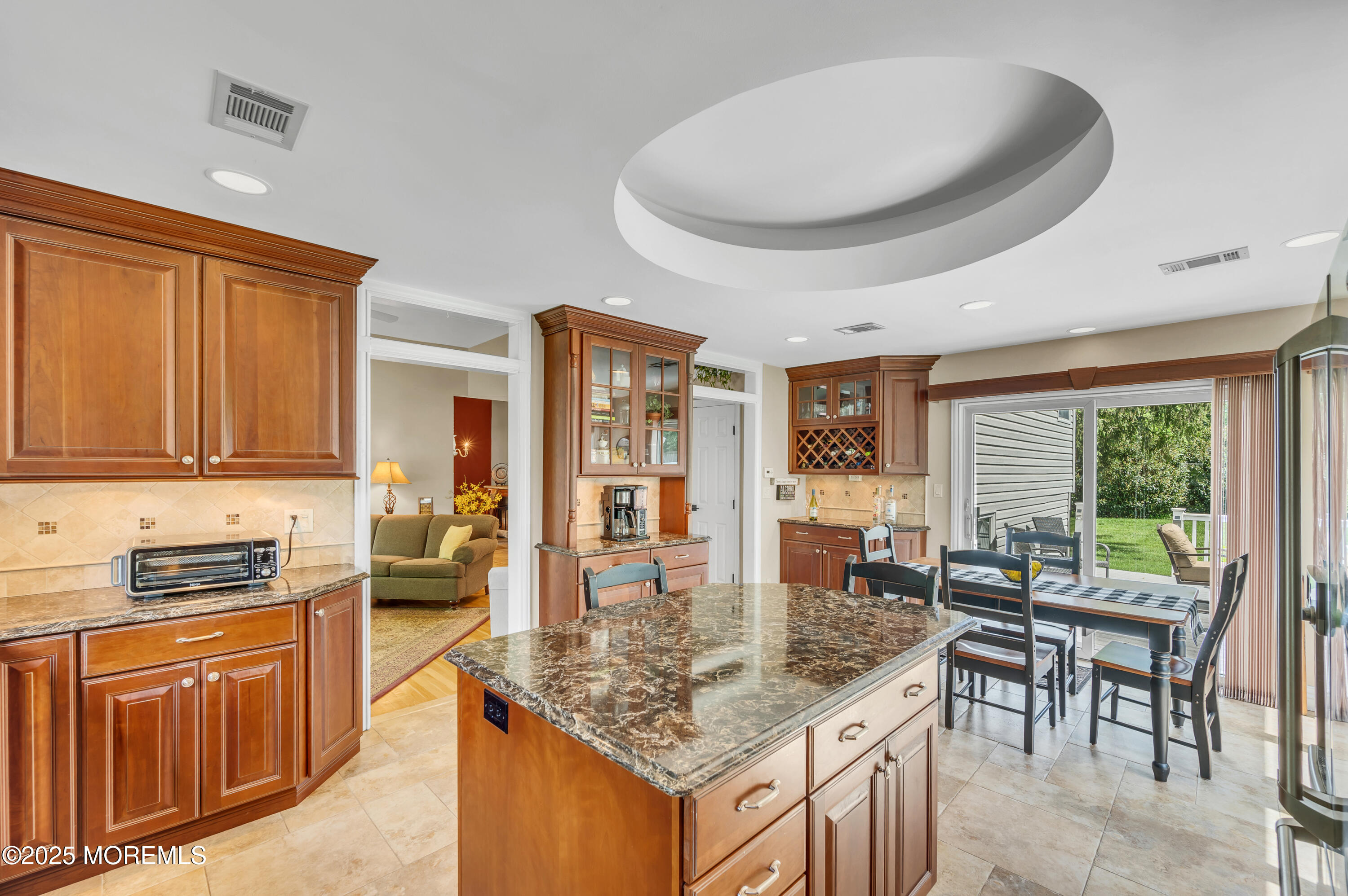 24 Daniel Drive Middletown, NJ 07748 - Photo 18 of 56 a kitchen with granite countertop sink stove and cabinets