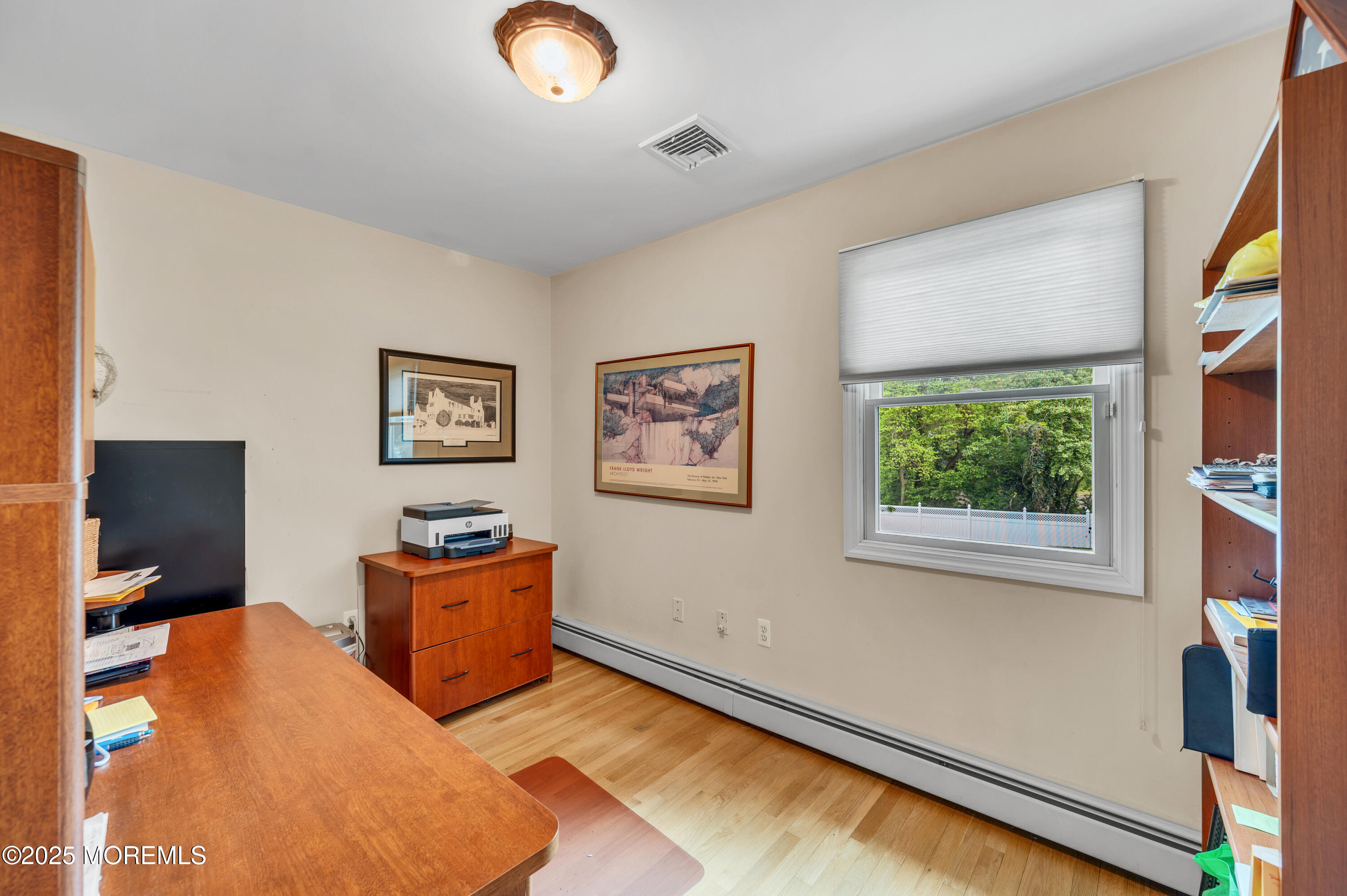 24 Daniel Drive Middletown, NJ 07748 - Photo 32 of 56 a bedroom with a bed and a flat screen tv