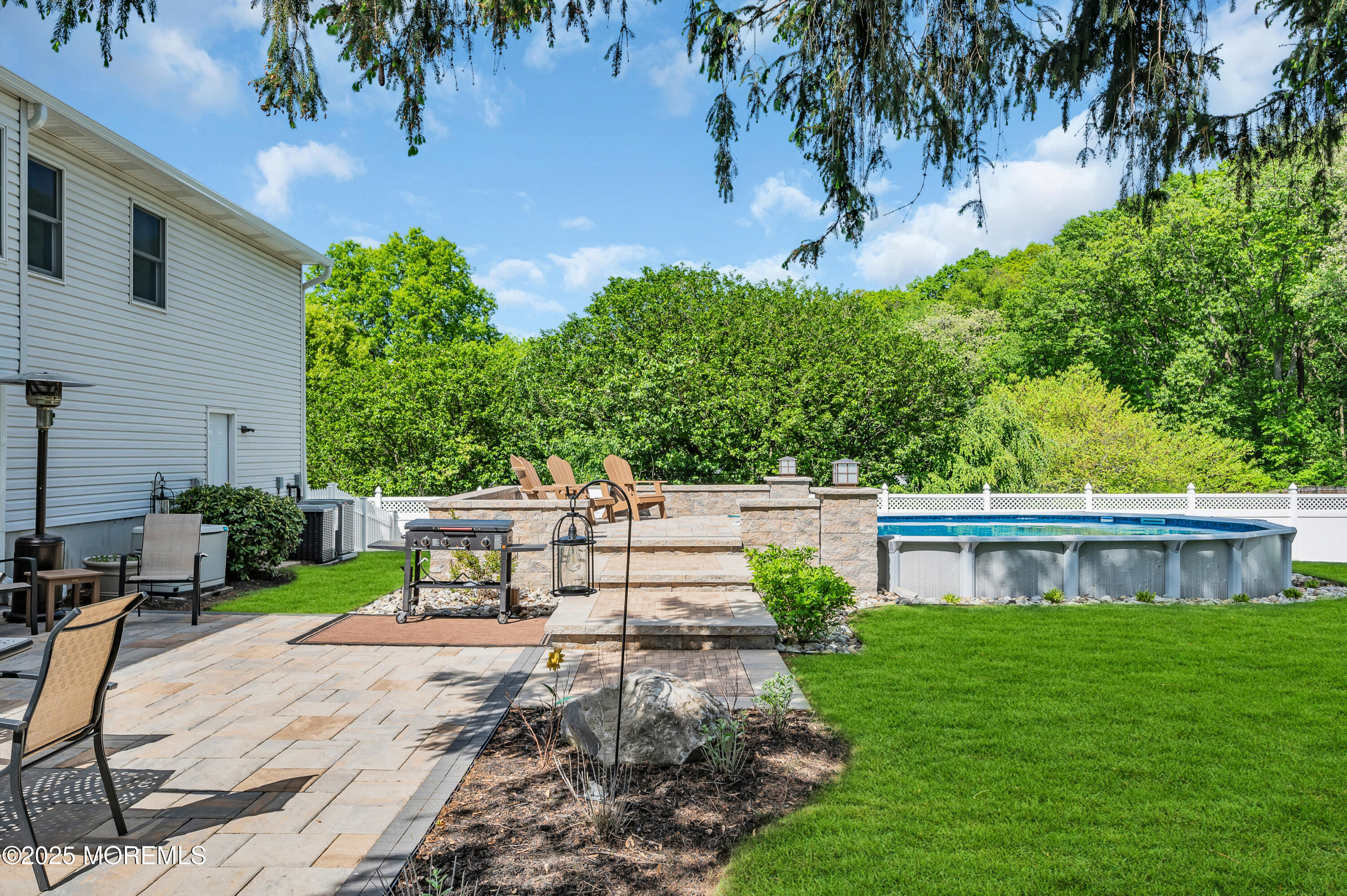 24 Daniel Drive Middletown, NJ 07748 - Photo 48 of 56 a view of a house with backyard and sitting area