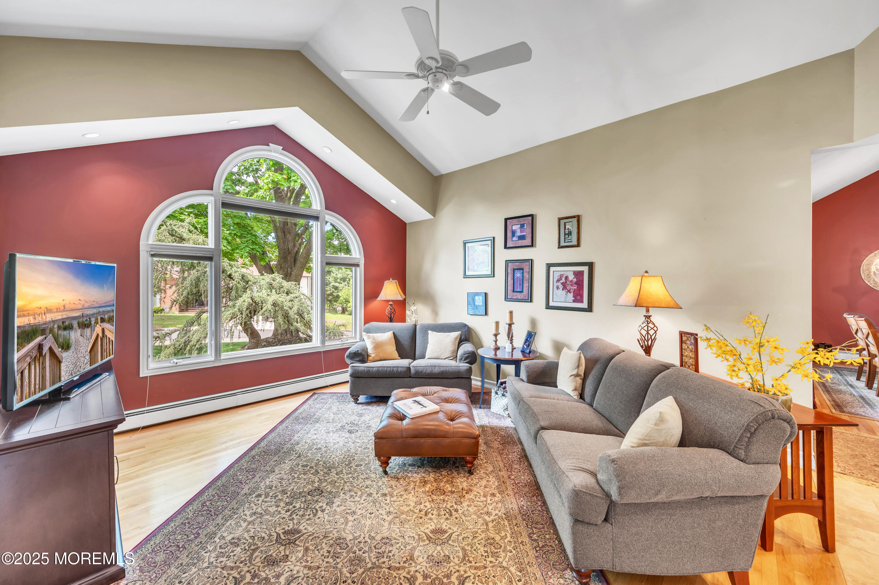 24 Daniel Drive Middletown, NJ 07748 - Photo 8 of 56 a living room with furniture and a large window