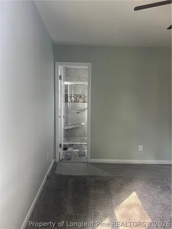 a view of outdoor space with wooden floor