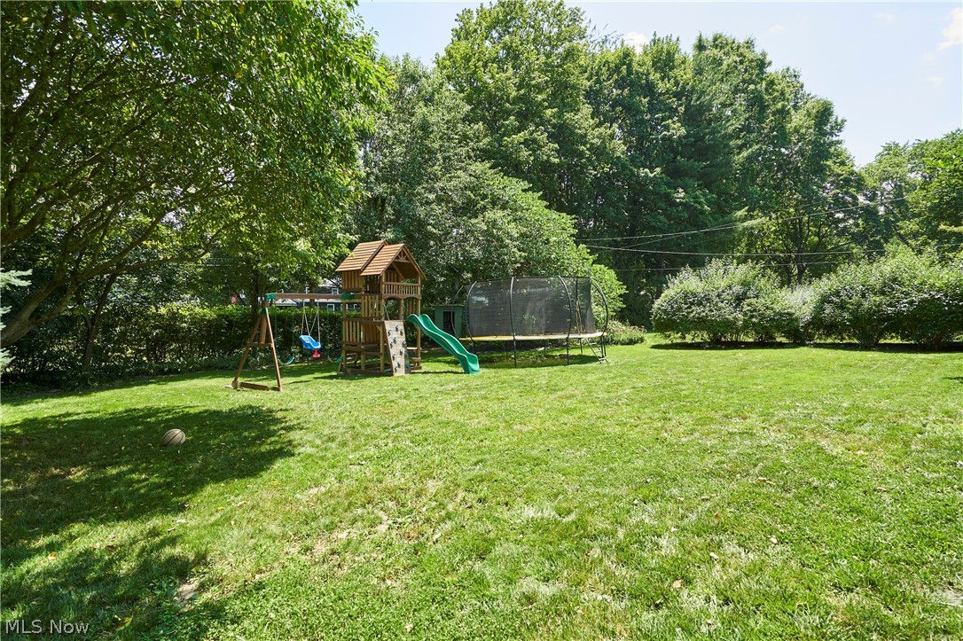 183 Overwood Road Akron, OH 44313 - Photo 17 of 34 Spacious green lawn with mature trees providing ample shade