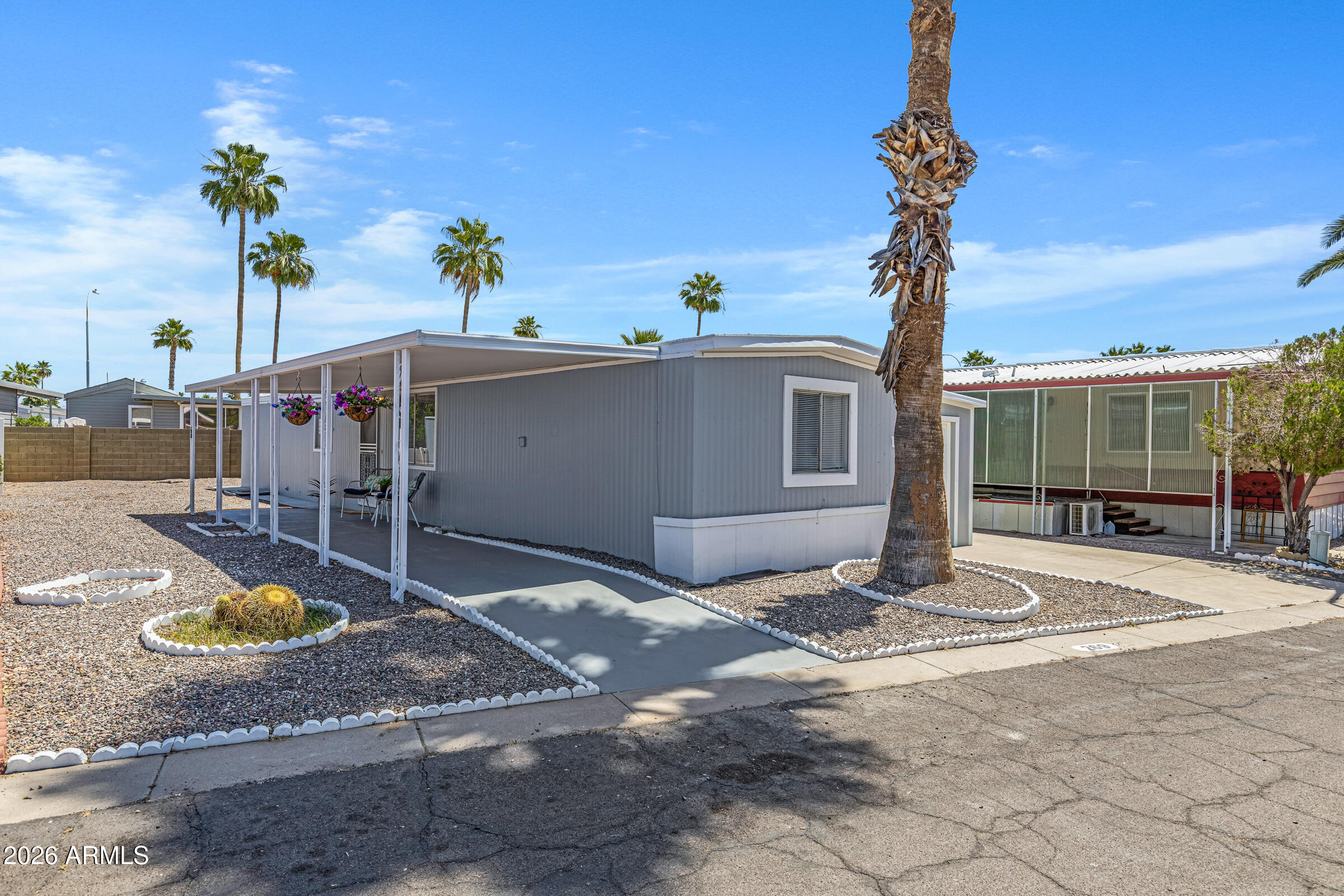 201 South Greenfield Road, Unit 269 Mesa, AZ 85206 - Photo 16 of 18 a house view with a garden space