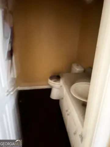 a bathroom with a sink and a toilet