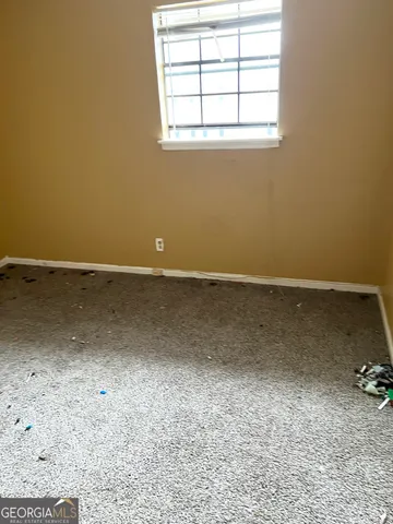an empty room with a workbench