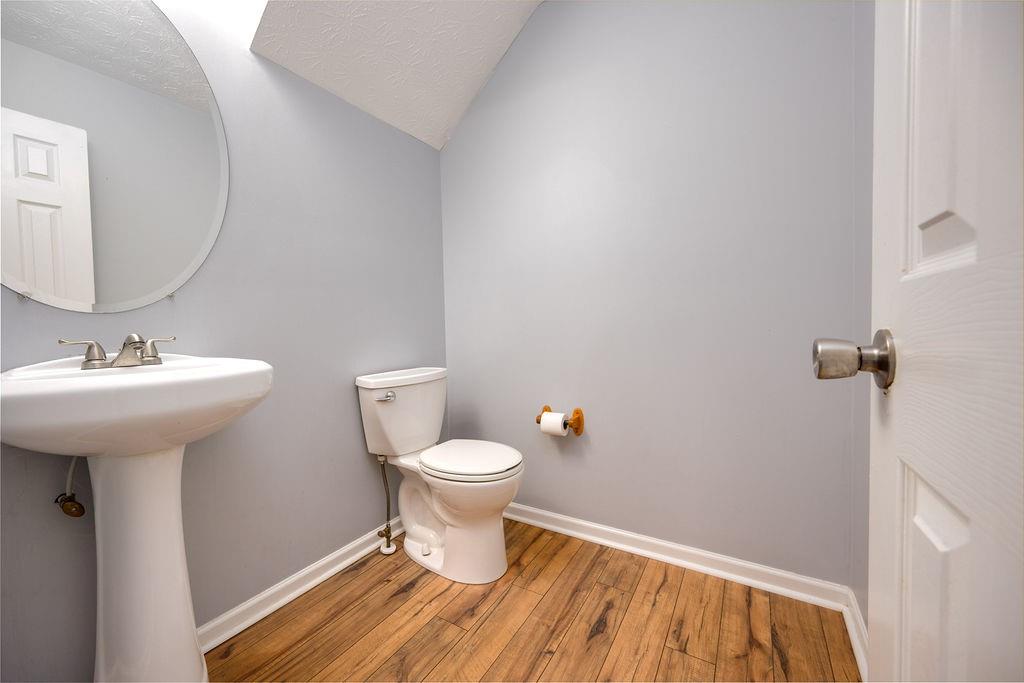 6280 Lake Valley Point Lithonia, GA 30058 - Photo 9 of 30 a bathroom with a sink and a mirror