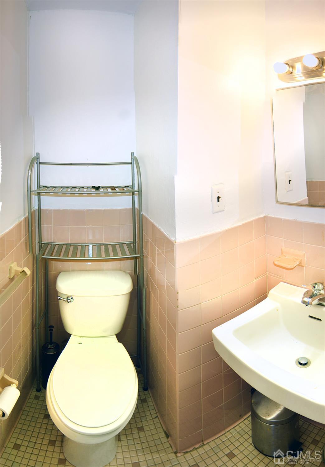 325 Rector Street Perth Amboy, NJ 08861 - Photo 8 of 20 Main level half bath.