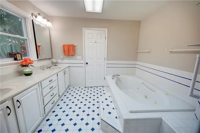 a view of a dining room with furniture wooden floor and chandelier