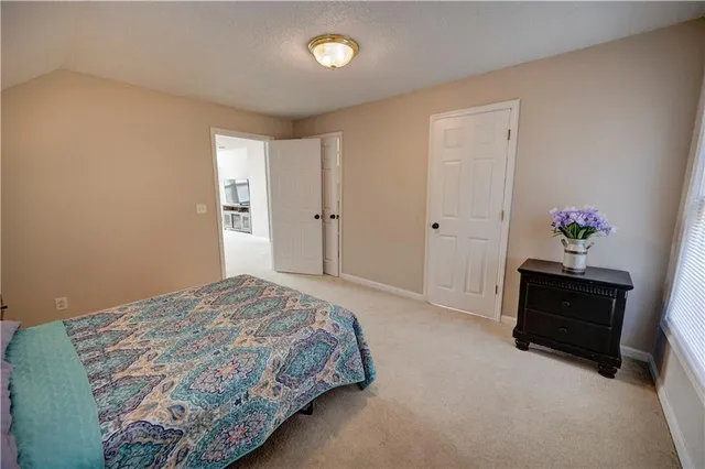 a view of a porch with wooden floor and stairs