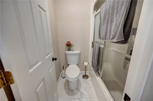 a bathroom with a bathtub and a sink