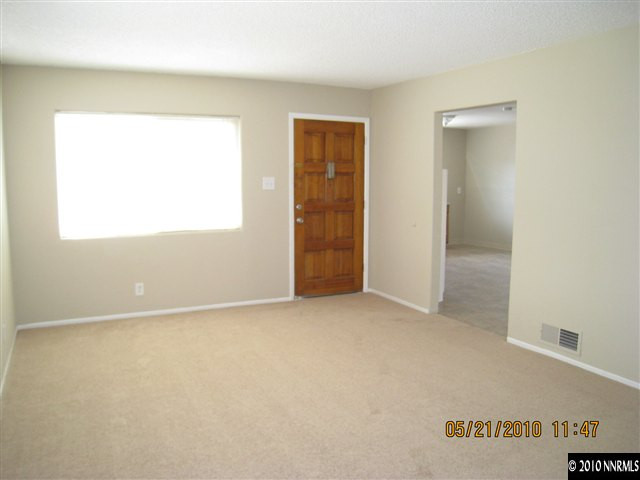 1975 Castle Way Reno, NV 89512 - Photo 2 of 6 an empty room with a window