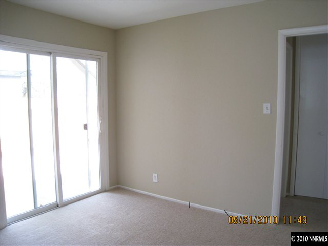 1975 Castle Way Reno, NV 89512 - Photo 4 of 6 a view of an empty room with a window
