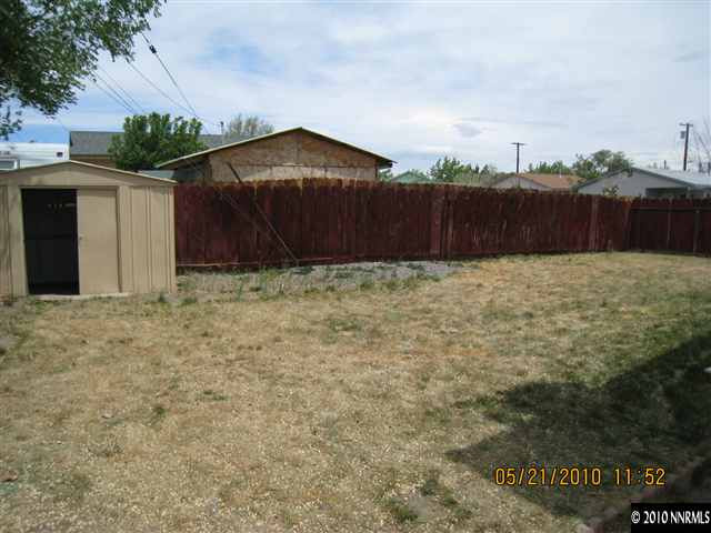 1975 Castle Way Reno, NV 89512 - Photo 6 of 6 a house with a yard