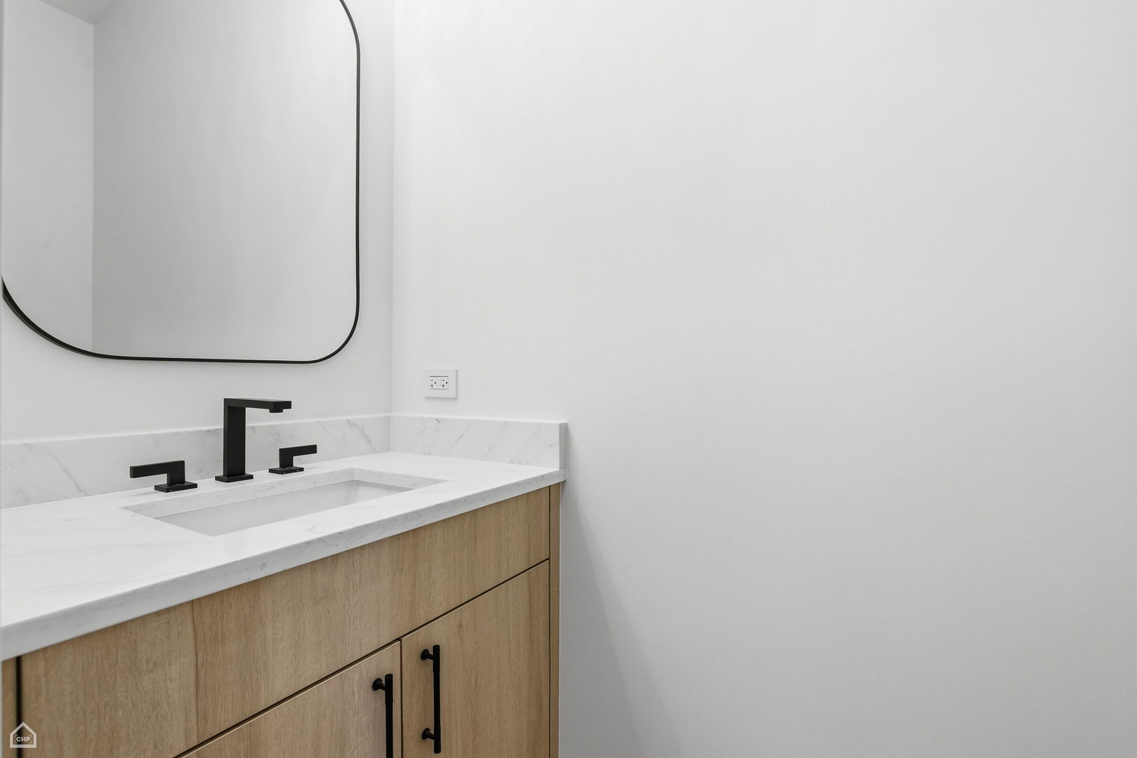 1100 Lois Avenue Park Ridge, IL 60068 - Photo 11 of 41 a bathroom with a sink and a mirror