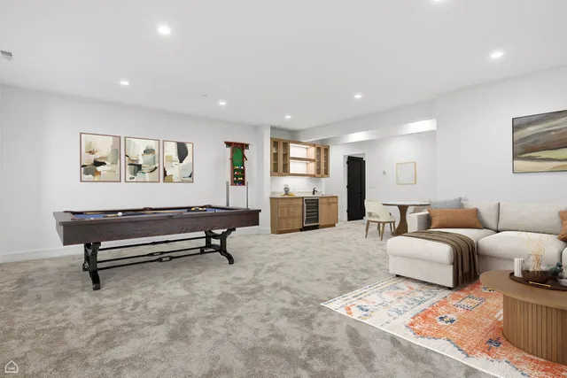 a living room with furniture a wooden floor and furniture