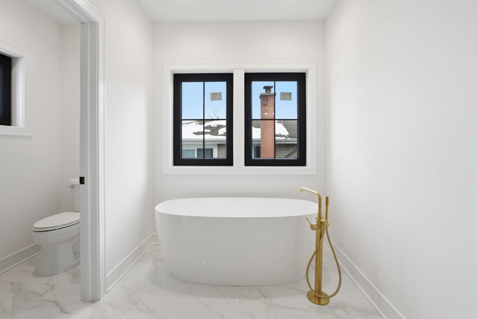 1100 Lois Avenue Park Ridge, IL 60068 - Photo 18 of 41 a white bath tub sitting next to a toilet