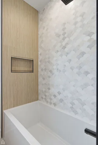 a bathroom with a bathtub