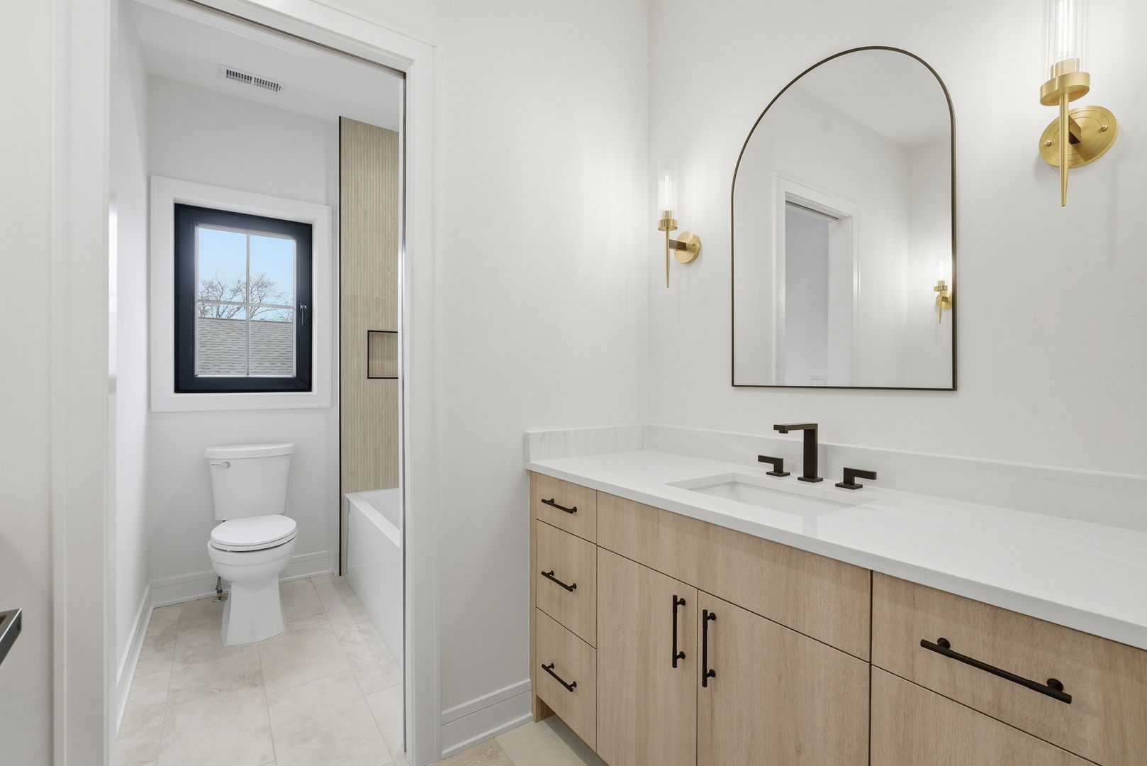 1100 Lois Avenue Park Ridge, IL 60068 - Photo 29 of 41 a bathroom with a toilet sink and mirror