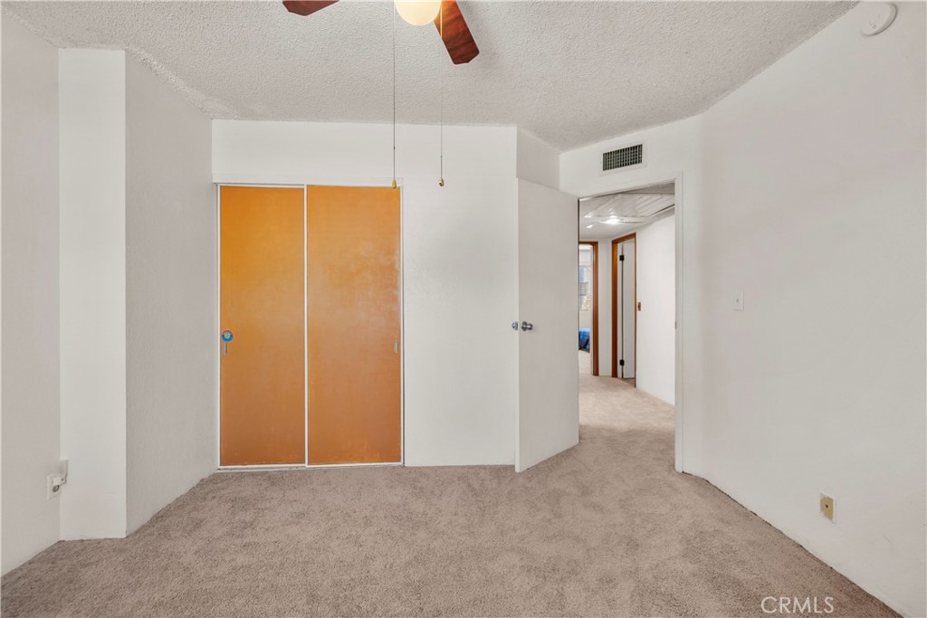 30602 San Martinez Road Val Verde, CA 91384 - Photo 15 of 47 a view of a room with furniture and a window